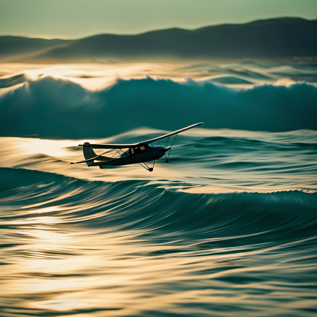 An image showcasing a sleek glider soaring above rippling turquoise waves, its wings gracefully cutting through the salty ocean breeze, as the distant sunset casts a warm golden hue on the horizon
