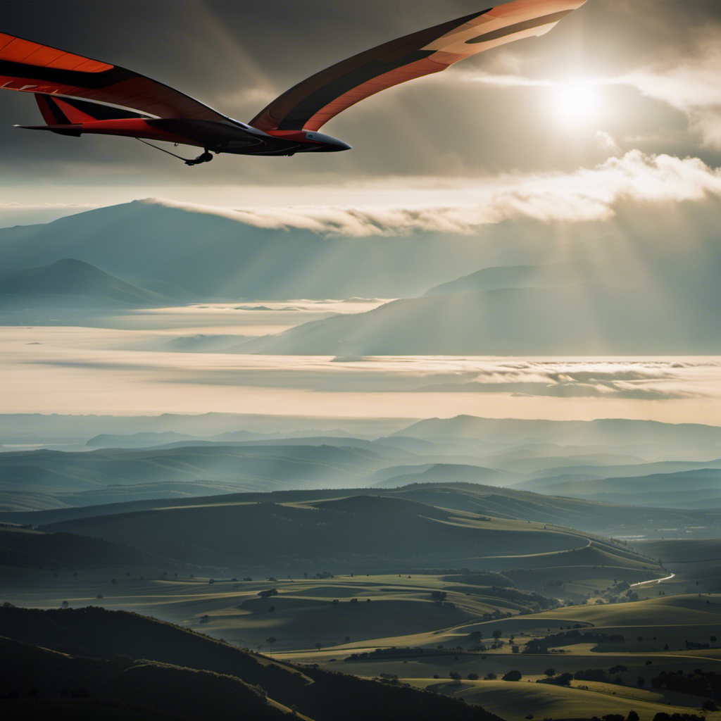 An image capturing the awe-inspiring spectacle of a dynamic soaring glider effortlessly gliding through the air, showcasing the intricate maneuvers, the sleek aerodynamic design, and the sheer exhilaration of this extreme sport