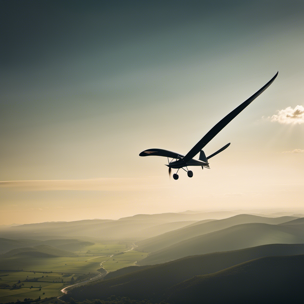 An image that showcases the graceful silhouette of a glider soaring high above a picturesque landscape, with sunlight illuminating its sleek wings, capturing the awe-inspiring engineering mastery of these magnificent aircraft