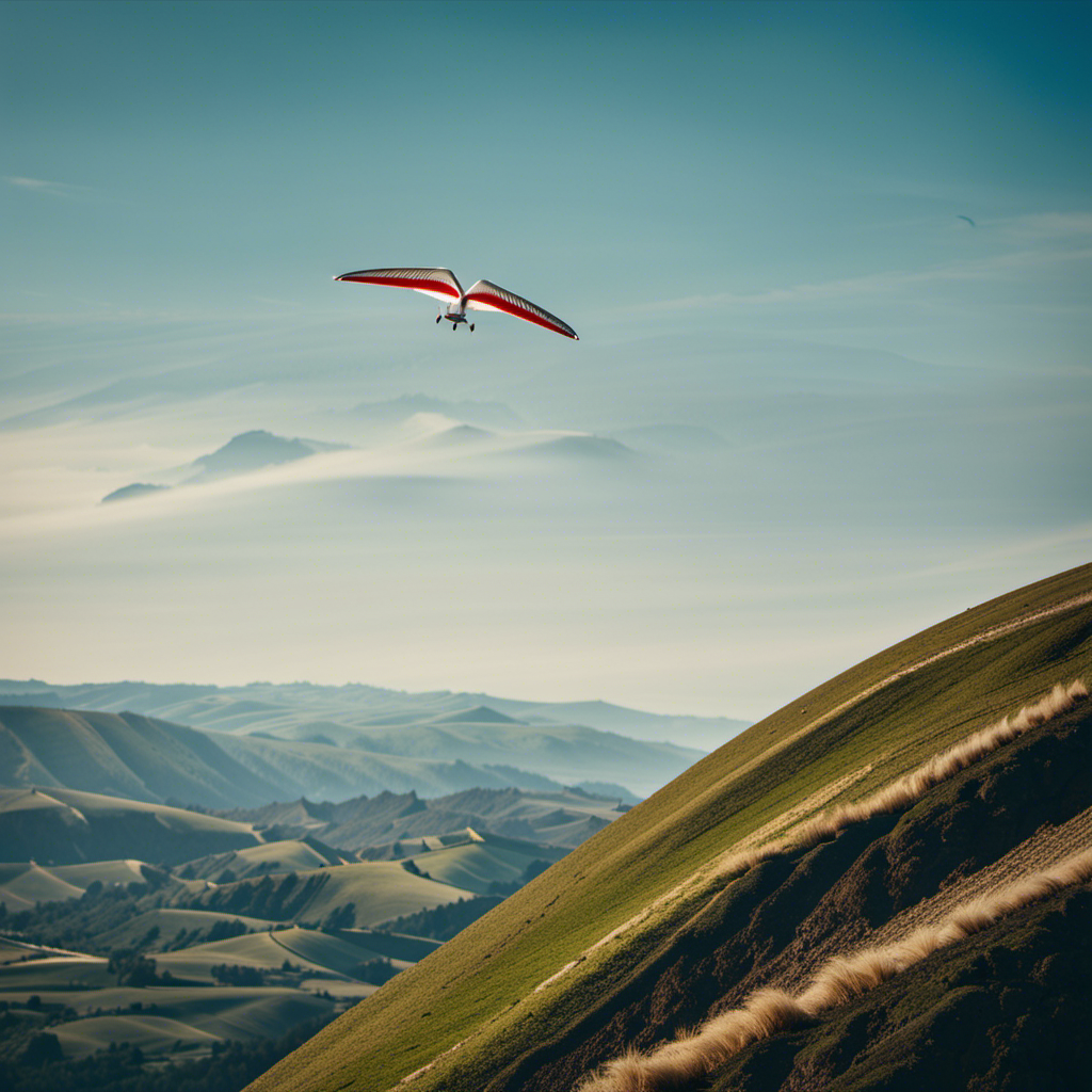 An image showcasing a graceful glider positioned at the top of a steep hill, its wings spread wide against the clear blue sky, ready to launch into flight assisted by the force of gravity alone