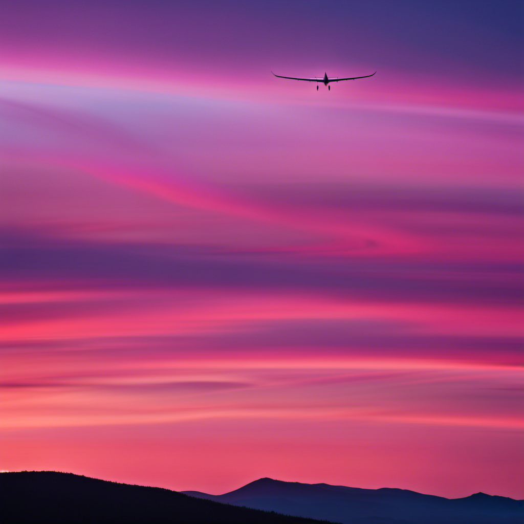 An image showcasing a serene sky at dawn, with a silhouette of a glider soaring gracefully amidst vibrant hues