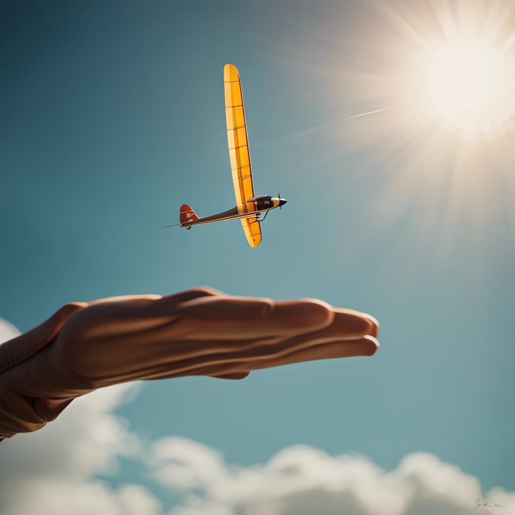 An image showcasing a hand gripping the elastic band firmly, as the glider is launched towards the sky