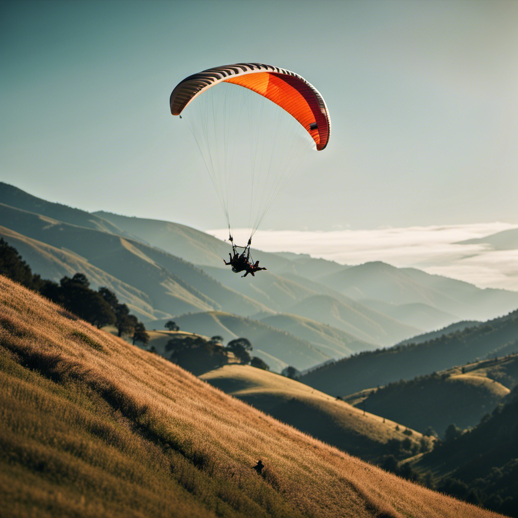 An image showing two individuals, one paragliding against a backdrop of rolling hills and another hang gliding over a rugged mountain range
