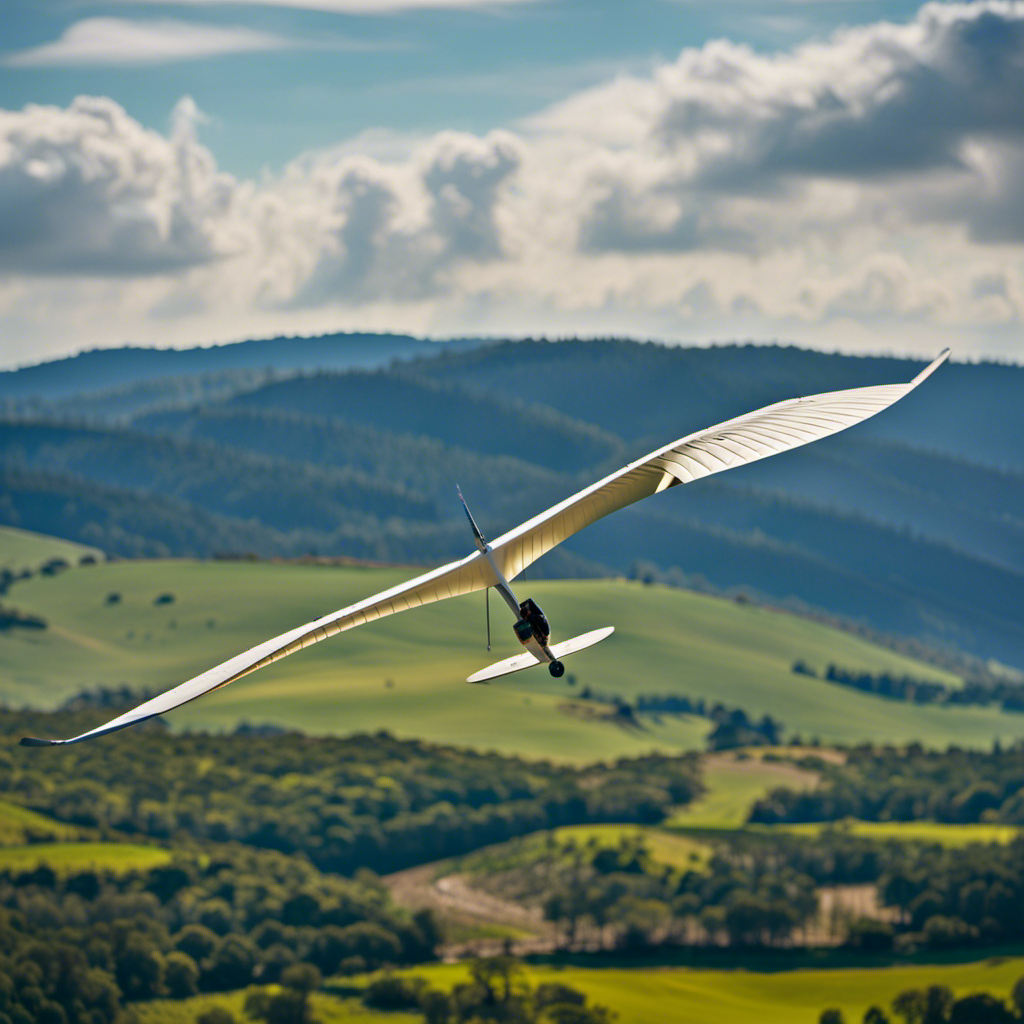 the exhilaration of gliding through the clear blue sky as a sleek glider soars above a picturesque landscape, its graceful wings slicing through the air, leaving a trail of awe-inspiring tranquility