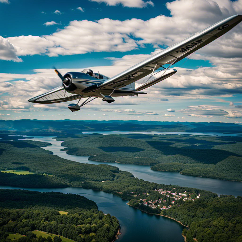 An image showcasing the scenic beauty of New York, with a glider plane gracefully soaring through the clear blue sky over the breathtaking landscapes of the Hudson Valley, offering a thrilling adventure for aviation enthusiasts